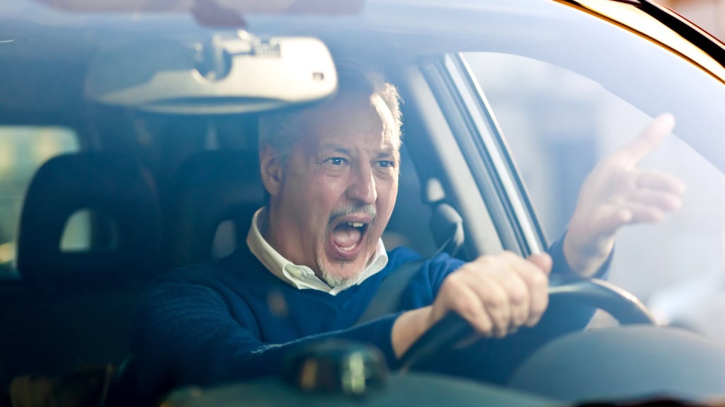 Encountering Road Rage: How to Stay Safe and How to Avoiding Losing Your Temper person yelling in their car