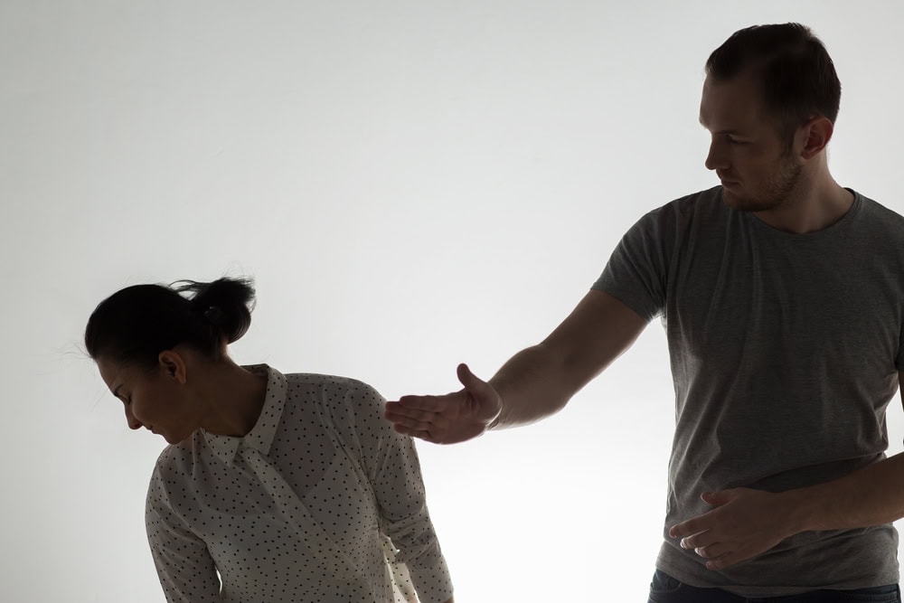 domestic violence, people and abuse concept - couple having fight and man slapping woman